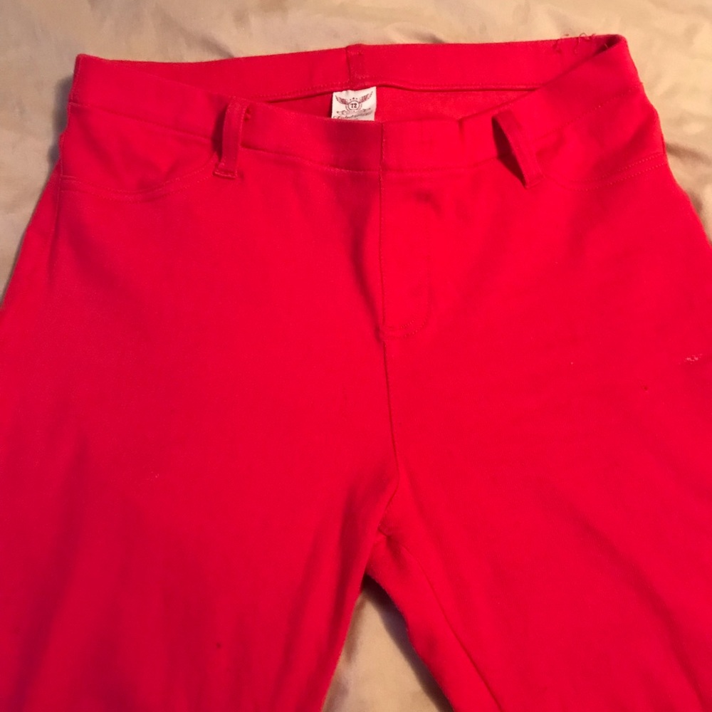 Bright red skinny jeans